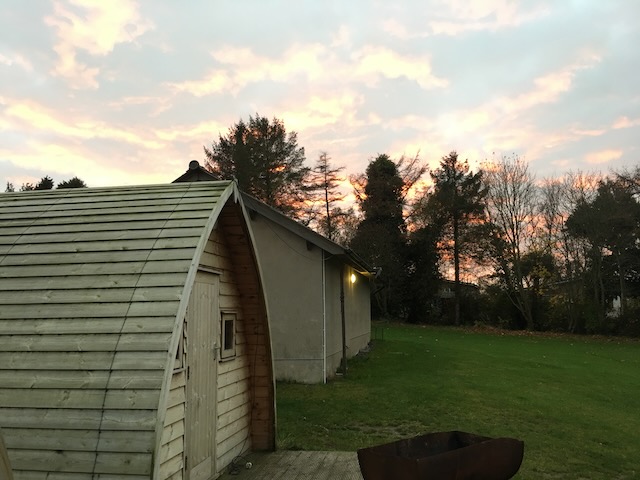 An small, arch-shaped wooden building